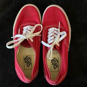 Red vans. Worn but still in good shape